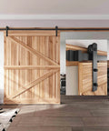 12 FT Heavy Duty Sliding Barn Door Hardware Track Kit with straight pulley, installed on wood door, black powder-coated steel