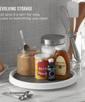 12 Inch Non Skid Pantry Lazy Susan Turntable, White and Gray Rotating Organizer with Rimmed Edge holding kitchen items