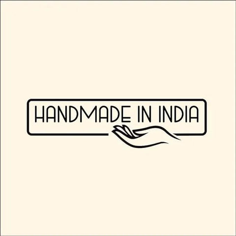 Handmade in India logo featuring a hand illustration and clean typography on a beige background.