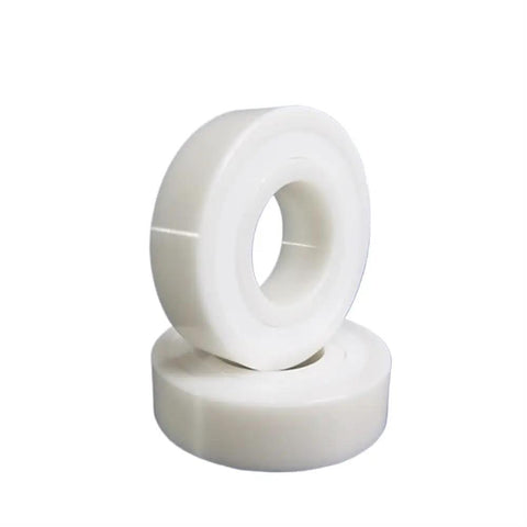 Premium Quality Hardcore Zirconia Ceramic Bearings Double Sealed Butter Smooth High Speed Operation Rock Solid Build Built Tough For Any Grind Plug And Play 12X21X5MM, white ceramic bearings stacked.