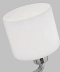Close-up of etched white glass shade from Canfield Three Light Wall Bath Vanity Fixture in Brushed Nickel Finish