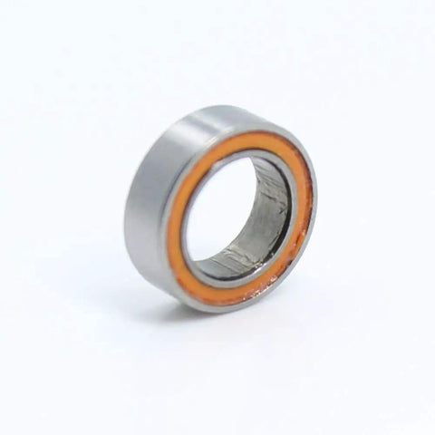 Close-up of one MR85RS 2RS color bearing 5x8x2.5 mm ABEC-3 orange sealed for hobby RC cars and trucks, showing seal detail.