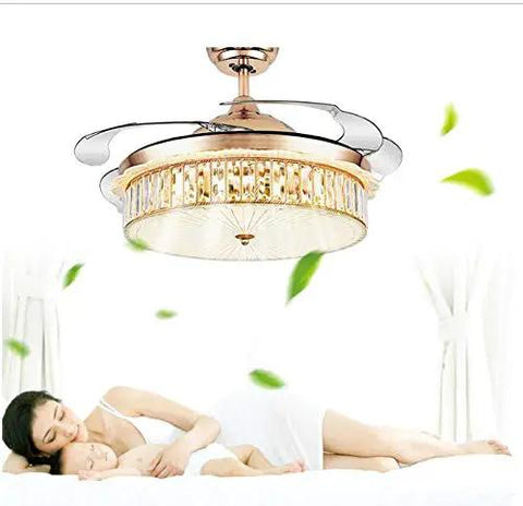 Top Shelf 42 Inch Invisible Ceiling Fan With Smooth Led Lighting Smart Folding Blades Barely Noticeable Spin Energy Efficient Wireless Remote Control For Kitchen Or Home Office in a cozy setting.