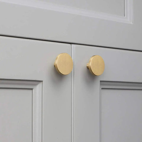 Solid Brass Round Cabinet Knobs 4 Pack, Beefy Yet Sleek Dresser Drawer Pulls on gray cabinet doors