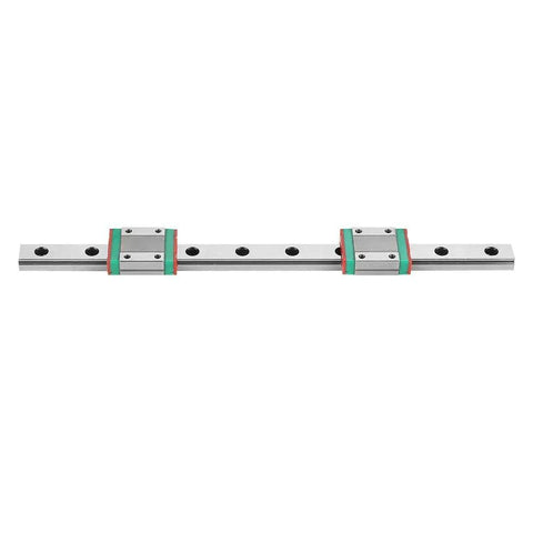 Solid Mgn12 Linear Guide Rail With Two Slide Blocks Offers A Tight 4-Point Design For Super Precise Motion And Smooth Operations In Compact Auto Gear Sets Without The Bulk Or Wobble. Image shows silver rail with green and red slide blocks.