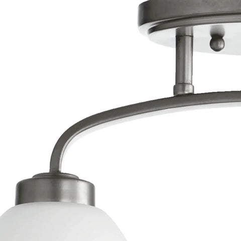 Detail of Two Light Bathroom Flush Mount From Reyes Collection In Classic Nickel Finish, showcasing sleek modern design.