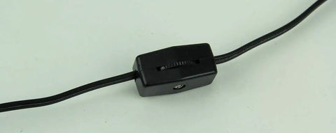 Close-up of black cord switch for Steampunk Industrial Fuel Dispenser Tower Table Lamp With Retro Machinery Vibe.