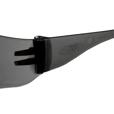 Close-up of Heavy Duty Outdoor Safety Eyewear Four Pack With Scratch Resistant Gray Lenses and Sleek Black Frames.