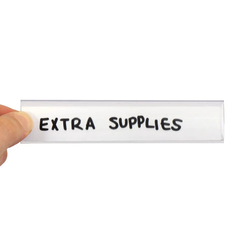 Slick Clear Plastic Shelf Clip Label Holders Fits One Inch Thick Racks No Sweat Installation Perfect For Warehouse Storage And Retail Inventory Management Pack Of Ten holding a labeled tag.
