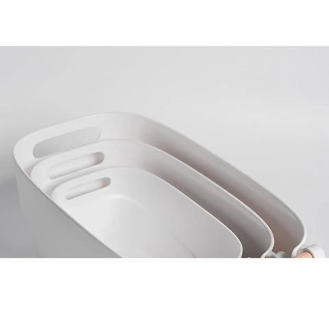 Top Shelf White Plastic Storage Basket With Lidless Opening For Zero Fuss Organization And Straight Up Space Saving Efficiency Ideal For Cozy Living Room Or Bedroom Vibes; three bins stacked, showcasing open top design and handle.