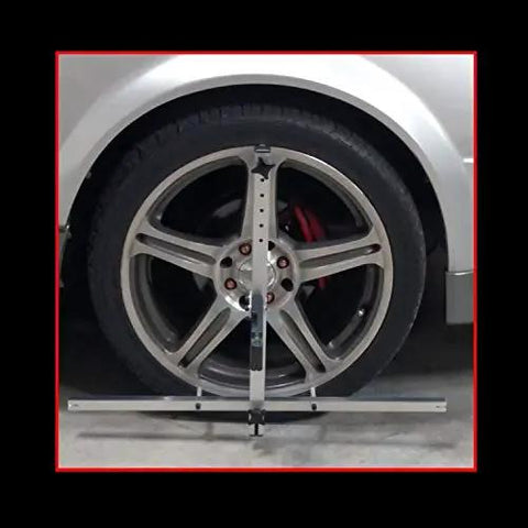Slick Portable Wheel Alignment Kit For 13 To 18 Inch Tires DIY Four Wheel Setup Caster Camber Toe Gauge positioned on a large alloy wheel.