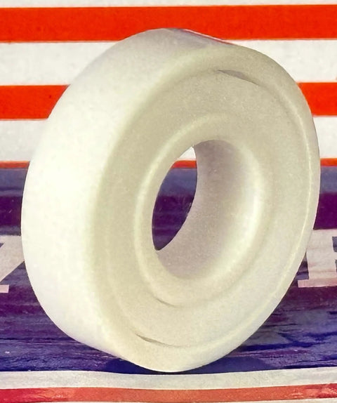 Side view of a single 30-Pack Full Ceramic 6001 ZrO2 Ball Bearing 12x28x8mm made of Zirconia Ceramic with PTFE cage