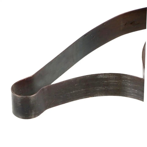 Close-up of a metal spring from a 4 Piece Mechanical Clock Main Spring Replacement Kit For Vintage Alarm Clocks DIY Restoration Low Maintenance Clock Parts Set For Home Office Or Collection Keeps Time Like A Pro.