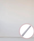Premium White Peel And Stick Waterproof Wallpaper For Cabinets And Showers Heavy Duty PVC Self Adhesive Sheet showcased on a smooth wall.