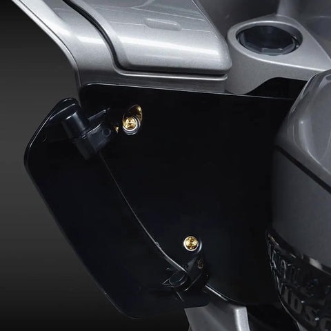 Fresh Gold Titanium Handlebar Clamp Bolts And Brake Clutch Perch Screws mounted on a Harley motorcycle, showcasing premium build quality.
