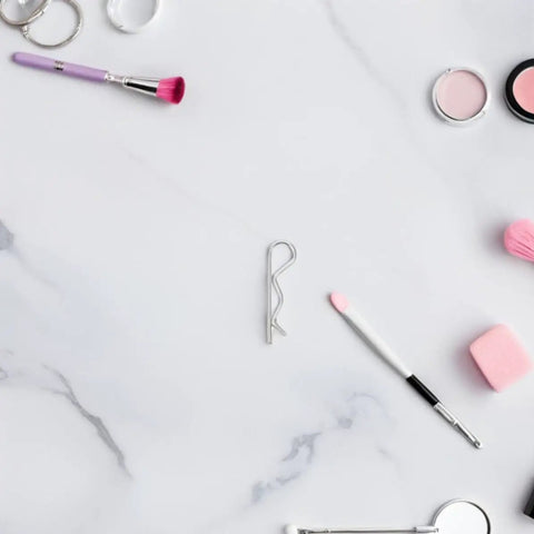 Premium Packove 8 Pcs Stainless Steel R Cotter Pins on a marble surface with beauty tools, designed for heavy duty use.