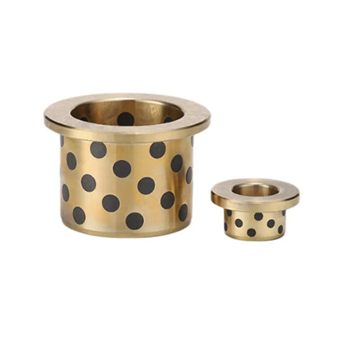 Top Shelf One Piece Flanged Oil Free Graphite Brass Bearing Sleeve Featuring Built In Self Lubricating Properties And Rock Solid High Load Durability For Smooth Heavy Duty Machinery Repair Work - two sizes, brass with black dots.