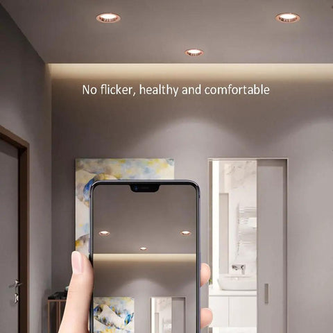 XYIANG Led Recessed Lighting with round aluminum trim showing illumination in a modern room, designed for comfort and health.