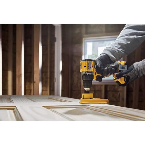 No Fuss Hella Slick 20V Max Brushless Cordless Drill Driver Kit With Compact Atomic Frame And One Half Inch Chuck Including 2Ah Lithium Ion Battery in use on wood panel