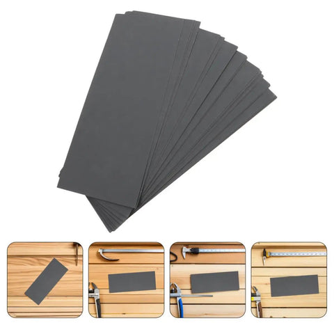 21Pcs Heavy Duty Grit Emery Sandpaper Sheets For Metal Wood And Furniture Sanding With Easy Grip Design on a workbench surface.