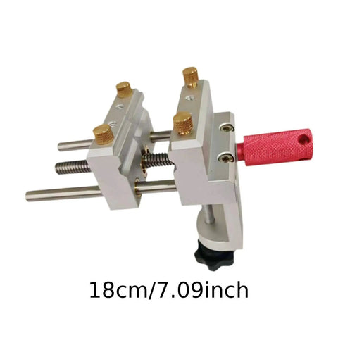Small Bench Vise For Home Workshop And Jewelry Making, 360 Degree Rotating Table Vice, close-up of jaws and handle, 18cm size
