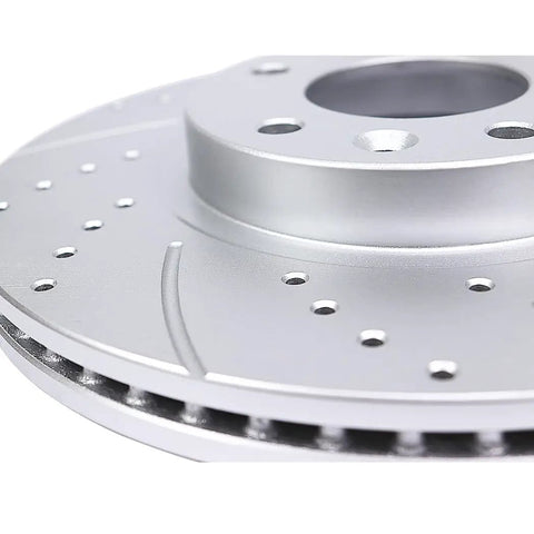Close-up of front drilled and slotted brake rotor in the kit for Toyota Sienna Highlander RX350 RX450h NX200T NX300 NX300h replacement.