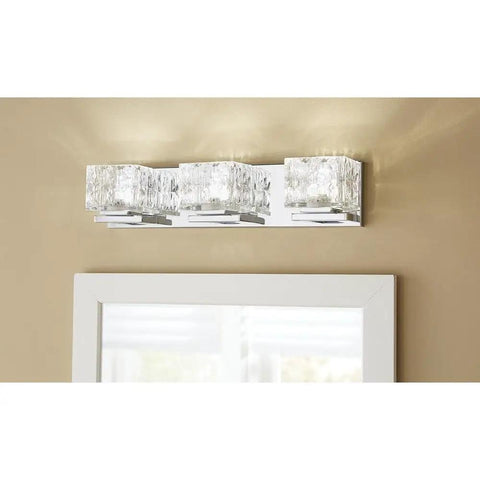 3 Light Sleek Chrome Integrated LED Vanity Light With Clear Cube Glass mounted above bathroom mirror