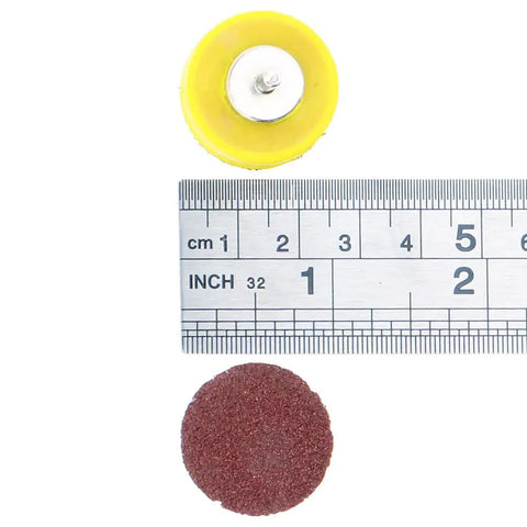1-inch sanding disc, ruler, and yellow shank pad from 110 Piece 1 Inch Sanding Disc Set With Shank And Backing Pads 40 To 600 Grit Hook And Loop Abrasive Kit