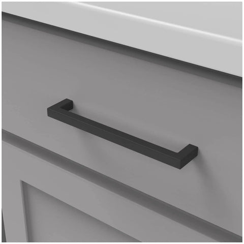 Solid Core Cabinet Pulls 10 Pack Matte Black Handles For Doors And Dressers Luxury Kitchen Hardware 6 5 Sixteenths Inch Hole Center Heavy Duty Skylight Collection installed on a gray cabinet drawer.