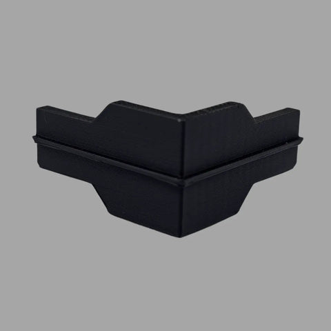 Twelve Pack Heavy Duty Corner Braces For Garage Shelving Systems Solid Black Steel Rack Connectors close-up view of a connector fitting.