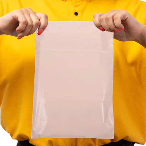 Waterproof PE Packaging Bags With Easy Seal 100 Pack Large Khaki Mailing Envelopes shown held up with easy-seal closure visible.