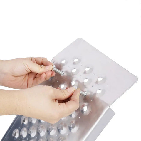 Close-up of hands assembling 2 Pack Aluminum Loading Ramps For Shed Use 4 Ft Long By 8.6 Inch Wide Heavy Duty 880 Lb Capacity.