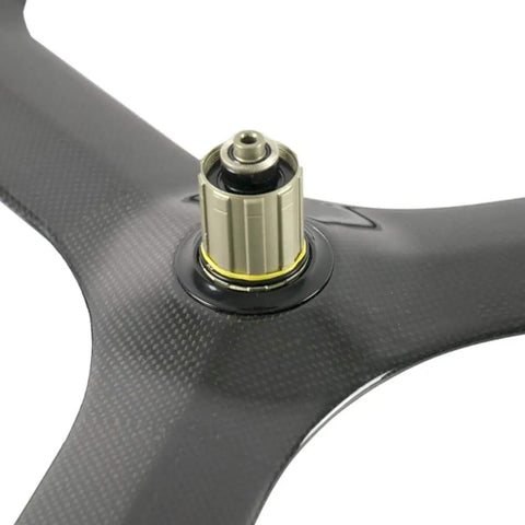 Close-up of hub on 70mm Tri Spoke Carbon Wheel For Road Bike 700C Clincher Rear Wheel With Toray T700 Rim And Shimano 8 9 10 11 Speed Cassette Body V Brake Compatible Ready To Roll.