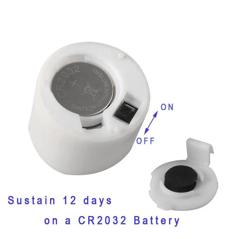 Flameless LED Tea Lights With Timer 6 Hours On 18 Hours Off Warm White 12 Pack Battery Included showing CR2032 battery and switch