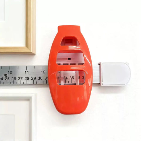 Hassle Free Picture Hanging Tool With Built In Spirit Level And Magnetic Nail Starter For Friction Free Wall Mounting, close-up view.