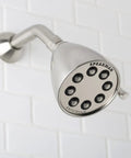 Icon Series Anystream High Pressure Adjustable Solid Brass Shower Head In Matte Black With 2.5 GPM Flow on tiled wall