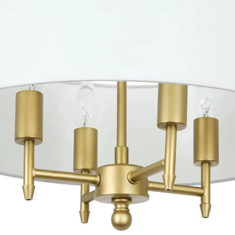 Close-up of 4 Light Modern Chandelier With White Linen Drum Shade In Antique Brass Finish For Dining Room.