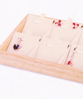 Retro Wooden Jewelry Organizer Tray With Eight Grids To Keep Your Bling Slick And Prevent Tangles While Displaying Necklaces And Earrings On Any Desk Surface with earrings and pendant.
