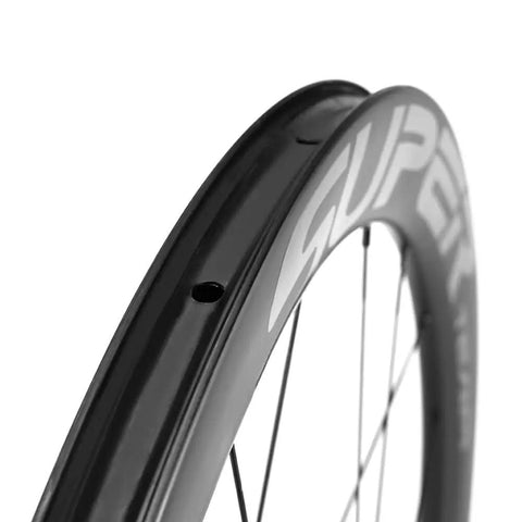 Close-up of Carbon Disc Road Wheelset 50TU-28-DB Tubeless 700C For SRAM 12-Speed Through Axle Front 12x100 showing rim detail