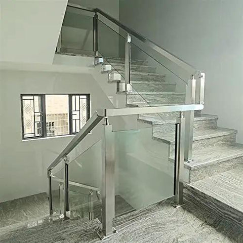 Premium Grade Stainless Steel 304 Railing Post Kit For Decks And Stairs Features Heavy Duty Silver Corner Bracket To Grip Glass Panels Providing Rock Solid Safety And Zero Hassle Setup installed on a modern staircase