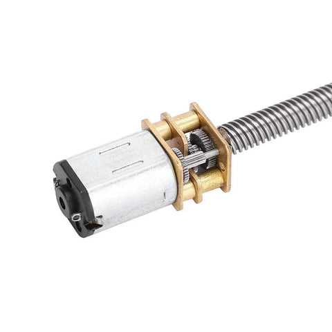 Run Smooth As Silk 12V DC Gear Reduction Motor With Long Output Shaft For Smart Car Cameras And Electronic Locks Offers Dead Silent Operation And Serious Torque Kick At 300 Rpm, metal gears and shaft detail.