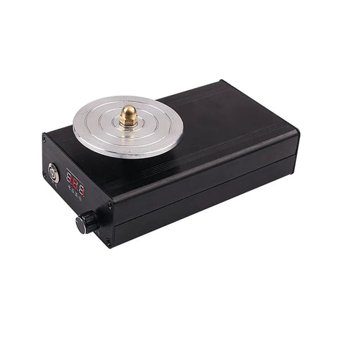Straight Shooting Engraving Knife Sharpener With Three Top Shelf Diamond Wheels, compact black and silver design for portable use.