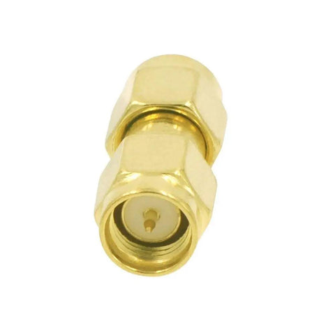 Close-up of SMA Male To SMA Male Coaxial Connectors 50 Ohm RF Adapters, gold plated with PTFE insulation, front view.