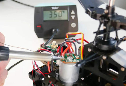 Soldering Education Kit 8 Piece Set with 70W Iron in use, showing temperature stability and precision soldering on a circuit board.