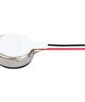 Close-up of a 10x3mm coin shape mini vibration motor with 5cm lead wires, from Twenty Five Pack Mini Vibration Motors 3V 12000 RPM.