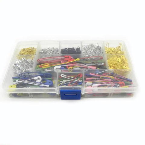 Kickass Assorted Steel Safety Pins Bulk Kit For Sewing Tailoring And Crafting in organizer box with various colored pins.