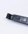 Close-up of TFI-35 Pro Grade Optical Fiber Identifier with 4 adapters for bare fiber, showcasing its testing features, in black.