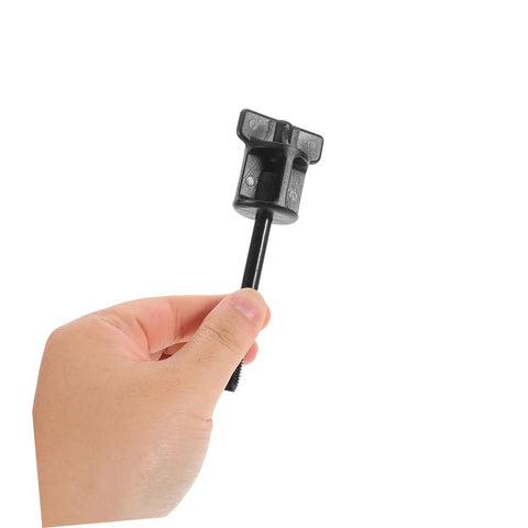 Hand holding Spare Tire Hold Down Kit With Aluminum Alloy Clamp Bolt Adapter For Honda Civic HRV And Other Popular Models Easy To Install Secure Fit No Wobble Reliable Spare Tire Mounting Solution For Cars And SUVs