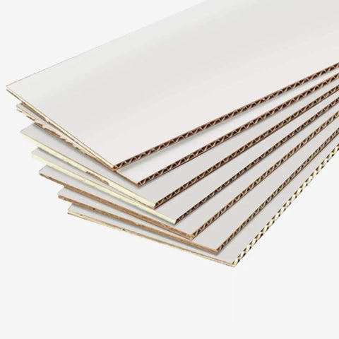 Heavy Duty Corrugated Shipping Boxes Crafted From Recyclable White Cardboard Mailers Ten By Seven By Five Inches Set Of Twenty Five stacked flat sheets of white cardboard.
