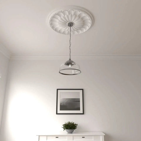Ceiling Medallion With Thirty One And Five Eighths Inch Outside Diameter And Three And Five Eighths Inch Inner Diameter Fits Canopies Up To Three And Five Eighths Inches Lightweight Easy Install With Common Tools Exquisite Detailing Factory Primed installed above a table in a room with minimalist decor.